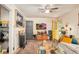 Inviting living room with unique decor, fireplace, a yellow door, and hardwood floors at 640 Willowbank Rd., Georgetown, SC 29440