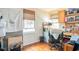 Bright office with hardwood floors, natural light, and built-in shelving at 640 Willowbank Rd., Georgetown, SC 29440
