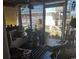 Bright sunroom featuring natural light, comfortable seating, decorative plants, and view of exterior at 640 Willowbank Rd., Georgetown, SC 29440