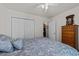 Well-lit bedroom with a large closet and a classic dresser with ornate detail at 6465 Royal Pine Dr., Myrtle Beach, SC 29588