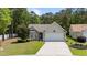 Charming single-story home with a well-maintained lawn and an attached two-car garage at 6465 Royal Pine Dr., Myrtle Beach, SC 29588
