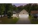 Charming single story home featuring a two-car garage and a well-maintained lawn at 6465 Royal Pine Dr., Myrtle Beach, SC 29588