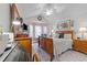Spacious main bedroom with hardwood floors, vaulted ceiling, and ample natural light at 6465 Royal Pine Dr., Myrtle Beach, SC 29588