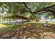 Community pavilion with picnic tables and playground, shaded by mature trees at 6465 Royal Pine Dr., Myrtle Beach, SC 29588