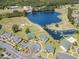 Aerial of a golf course and a community with ponds and manicured landscaping at 673 Tupelo Ln. # G, Longs, SC 29568