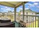 Relaxing balcony offering views of community landscaping and other condo buildings at 673 Tupelo Ln. # G, Longs, SC 29568