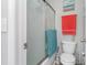 Functional bathroom features a shower with sliding doors, a toilet, and a towel rack at 673 Tupelo Ln. # G, Longs, SC 29568