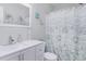 Bright bathroom with white vanity, updated fixtures, and shower with themed curtain at 673 Tupelo Ln. # G, Longs, SC 29568