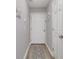 Light gray entryway with patterned runner rug and white doors at 673 Tupelo Ln. # G, Longs, SC 29568