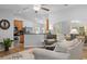 Bright living room featuring modern decor, hardwood floors and comfortable seating at 680 Twinflower St., Little River, SC 29566