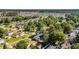 Aerial view of neighborhood showing mature landscaping and nearby lake at 6864 Woodhaven Dr., Myrtle Beach, SC 29588