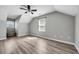 Bedroom boasts natural light and neutral walls with wood-look floors at 6864 Woodhaven Dr., Myrtle Beach, SC 29588
