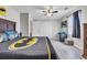 Cozy bedroom with gray walls, wood-look flooring, and a Batman-themed comforter at 6864 Woodhaven Dr., Myrtle Beach, SC 29588