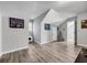 Bonus room with wood-look flooring, neutral walls, and ample space for activities at 6864 Woodhaven Dr., Myrtle Beach, SC 29588