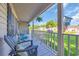 Inviting front porch with cozy seating, providing a comfortable space to enjoy the neighborhood views at 6864 Woodhaven Dr., Myrtle Beach, SC 29588