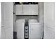 Bright laundry room with washer, dryer and ample storage cabinets at 6864 Woodhaven Dr., Myrtle Beach, SC 29588