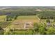 Wide aerial shot of homes on large lots surrounded by trees and open land at 7019 Norton Rd., Green Sea, SC 29545