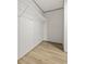 Walk in closet with wire rack shelving and wood look flooring at 7019 Norton Rd., Green Sea, SC 29545