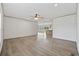 Open-concept living room shows connection to the kitchen and its island at 7019 Norton Rd., Green Sea, SC 29545