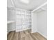 Walk-in closet with custom shelving offering ample storage and organization solutions for clothes and accessories at 709 Yucca Ave., Myrtle Beach, SC 29577