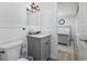 Bathroom with marble vanity, updated fixtures, and wainscoting, connecting style and practicality for a refreshing feel at 709 Yucca Ave., Myrtle Beach, SC 29577