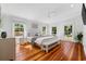 Spacious bedroom with hardwood floors, large windows, and neutral decor at 709 Yucca Ave., Myrtle Beach, SC 29577