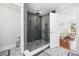 Modern shower with glass surround and gray tile at 709 Yucca Ave., Myrtle Beach, SC 29577