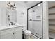 Bathroom with modern vanity, and tiled shower, balancing style and functionality for a refreshing experience at 709 Yucca Ave., Myrtle Beach, SC 29577