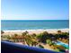 Breathtaking ocean view from a balcony overlooking the beach, palm trees and resort pool at 7100 N Ocean Blvd. # 621, Myrtle Beach, SC 29572