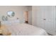 Inviting bedroom featuring a comfortable bed, decorative mirror, ample storage, and neutral tones for relaxation at 7367 Meadow Walk Loop, Loris, SC 29569