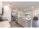 Bright, open kitchen featuring an island with granite countertops, stainless steel appliances, and modern cabinets at 7367 Meadow Walk Loop, Loris, SC 29569