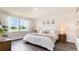 Serene bedroom with a large window, plush bedding, and a peaceful ambiance for restful nights at 7399 Meadow Walk Loop, Loris, SC 29569
