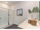 Bathroom showcases a glass shower, a neutral color scheme, and quartz countertops at 7415 Meadow Walk Loop, Loris, SC 29569