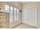 Bright bedroom with a double door closet and a window with white shutters, paired with a classic dresser at 78 Saltwind Loop, Murrells Inlet, SC 29576