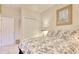 Cozy bedroom featuring a patterned comforter, soft carpet, and closet at 78 Saltwind Loop, Murrells Inlet, SC 29576