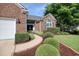 Close up of a lovely brick home featuring manicured landscaping and a cozy entrance at 78 Saltwind Loop, Murrells Inlet, SC 29576