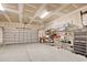 Spacious two car garage with an automatic door, storage shelving, and a Craftsman rolling tool chest at 78 Saltwind Loop, Murrells Inlet, SC 29576