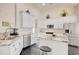 Modern kitchen featuring granite countertops, stainless steel appliances, and custom white cabinetry at 78 Saltwind Loop, Murrells Inlet, SC 29576