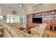 Spacious living room with a large built-in entertainment center and comfortable seating arrangements at 78 Saltwind Loop, Murrells Inlet, SC 29576