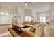 Open-concept living area featuring hardwood floors, comfortable seating, and a view towards dining area at 78 Saltwind Loop, Murrells Inlet, SC 29576