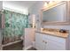 Well-maintained bathroom featuring granite countertops, a framed mirror, and stylish accents at 8887 Chandler Dr. # A, Myrtle Beach, SC 29575