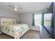 Inviting bedroom showcasing a serene ambiance, ceiling fan and natural light at 8887 Chandler Dr. # A, Myrtle Beach, SC 29575