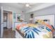 Relaxing bedroom features a queen bed, soft wall color, and natural light creating a peaceful retreat at 8887 Chandler Dr. # A, Myrtle Beach, SC 29575