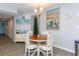 Cozy dining area featuring seating for four, soft paint color, and beachy decor for a welcoming space at 8887 Chandler Dr. # A, Myrtle Beach, SC 29575