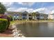 Beautiful condominium building overlooking the lush landscaped grounds and tranquil lake at 8887 Chandler Dr. # A, Myrtle Beach, SC 29575