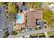 Overhead view of community pool, landscaping, parking, and building exteriors on a sunny day at 9501 Shore Dr. # C-328, Myrtle Beach, SC 29572