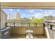 Balcony view with a glimpse of the pool, neighborhood, and high-rise buildings at 9501 Shore Dr. # C-328, Myrtle Beach, SC 29572