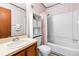 Bathroom featuring a shower and tub, toilet, sink and vanity with storage at 9501 Shore Dr. # C-328, Myrtle Beach, SC 29572