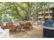 Outdoor grilling area featuring wooden picnic tables and propane grills at 9501 Shore Dr. # C-328, Myrtle Beach, SC 29572