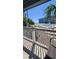 Exterior shot with palm trees and ocean view from the porch at 9540 Shore Dr. # 1N, Myrtle Beach, SC 29572